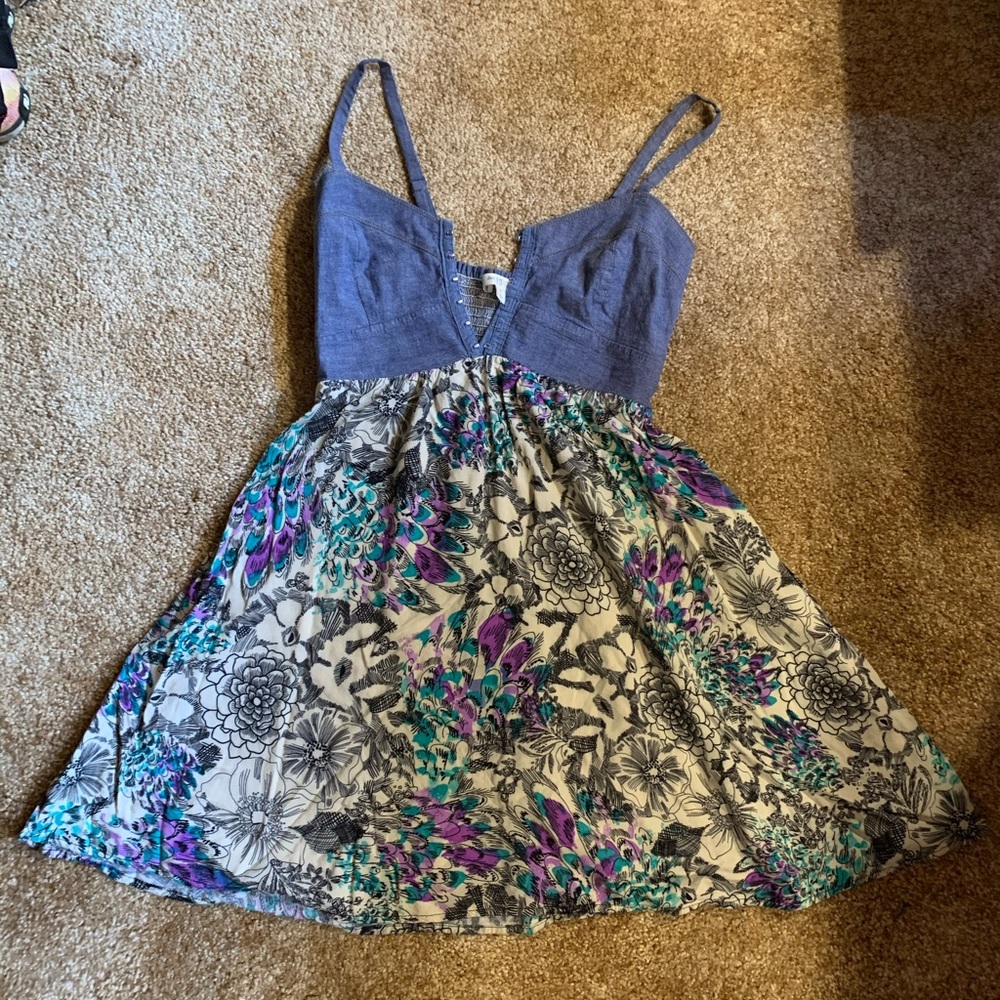 Jean dress with a flower accent bottom half